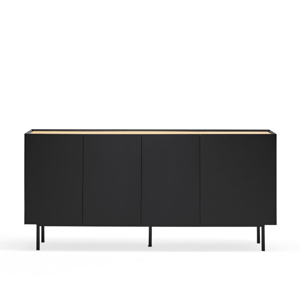 A modern black sideboard cabinet with four doors, slim black legs, and a light wood top edge, shown against a plain white background.
