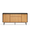 A mid-century modern sideboard cabinet with light wood grain doors, a black top surface, and slim black metal legs, shown against a plain white background.