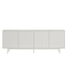 A modern sideboard cabinet with four vertically ribbed doors in a light gray finish, supported by slim metal legs, shown against a plain white background.