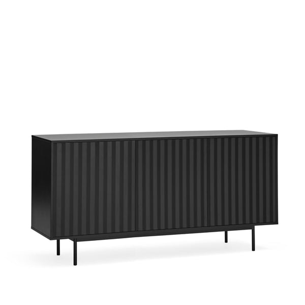 A modern black sideboard cabinet with a ribbed front and slim legs, shown on a plain white background.