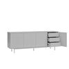 A modern light gray sideboard cabinet with three vertically ribbed doors on the left, three drawers on the right, and an open side door. The cabinet stands on slim metal legs against a plain white background.