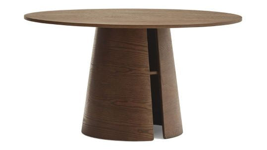 A round wooden dining table with a tapered, split-cone pedestal base, shown on a solid white background.