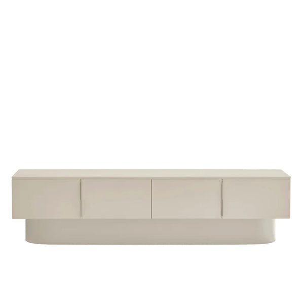 A modern low-profile sideboard or credenza in a light beige finish, featuring four cabinet doors and a matching rounded base, shown against a plain white background.