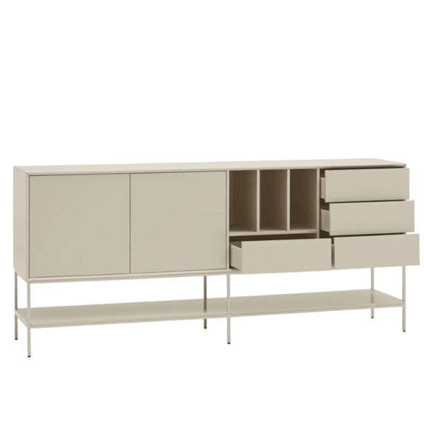 A modern sideboard cabinet with a minimalist design, featuring two large doors, open cubbies, three drawers, and a lower open shelf on slim metal legs, shown against a plain light gray background.