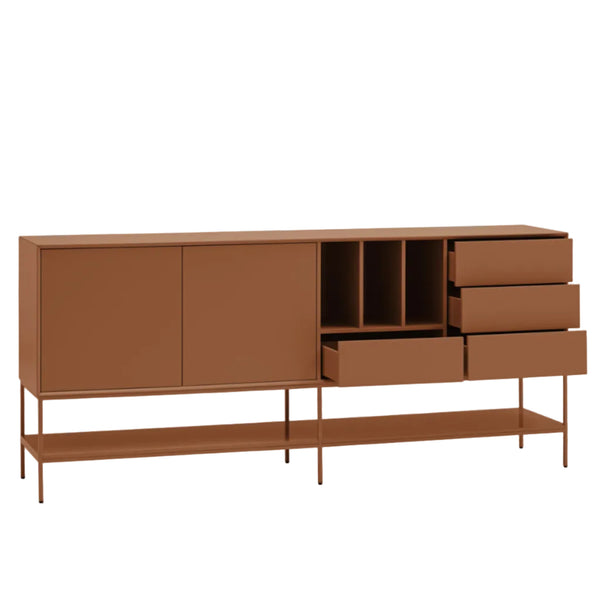 A modern sideboard cabinet in a warm terracotta brown finish, featuring two large doors, three drawers, open cubbies, and a lower open shelf on slim metal legs, shown against a light gray background.