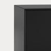 Close-up of a black rectangular product corner with a matte finish against a light gray background.