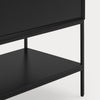 Close-up of a black wooden cabinet or shelf unit with a single drawer and an open lower shelf, shown against a light gray background.